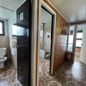 hostal-bella-vista-puerto-cisnes-baños