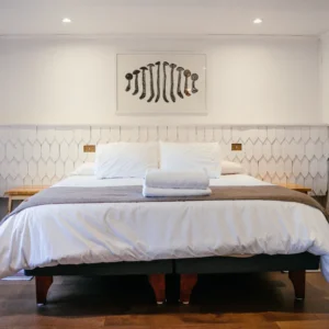 hostal-bella-vista-puerto-cisnes-dormitorio-suite